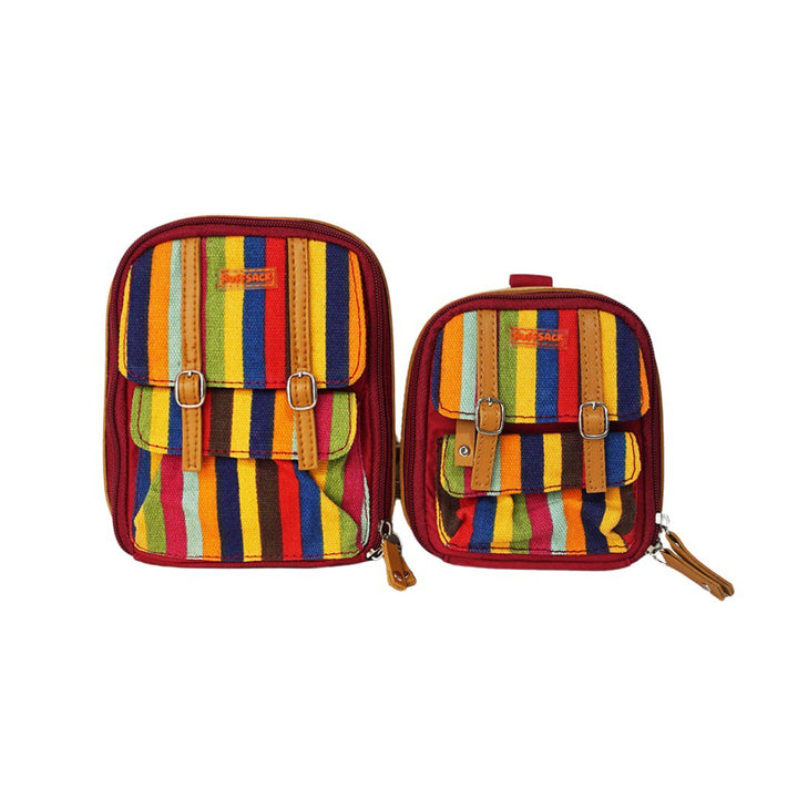 Dale Stripe model Ruffsack backpack front angle. The backpack face features a cotton multicolor, vertical striped pattern with two small front buttoned pockets. Tan faux leather accents are on the front and sides of the bag. A side zipper allows access to the inside.