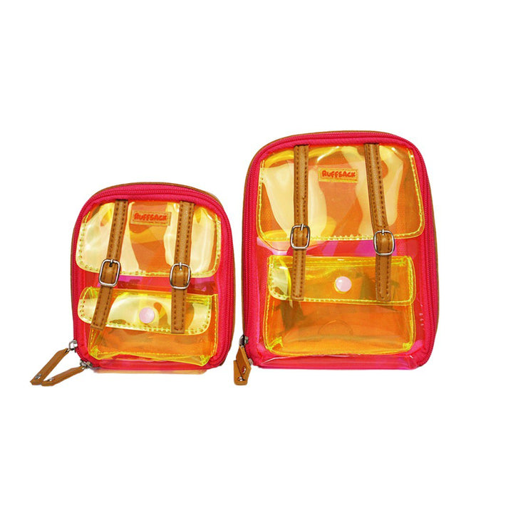Jelly Dale, Pink and Yellow, model Ruffsack backpack front angle. The backpack face features a transparent pink and yellow plastic with a small front buttoned pocket. Tan faux leather accents are on the front and sides of the bag. A side zipper allows access to the inside.