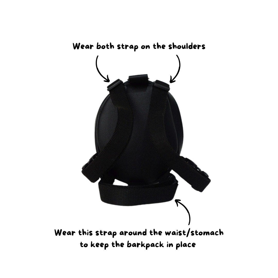 How to wear a Ruffsack backpack by wearing the straps around the shoulders and stomach to secure the backpack in place.