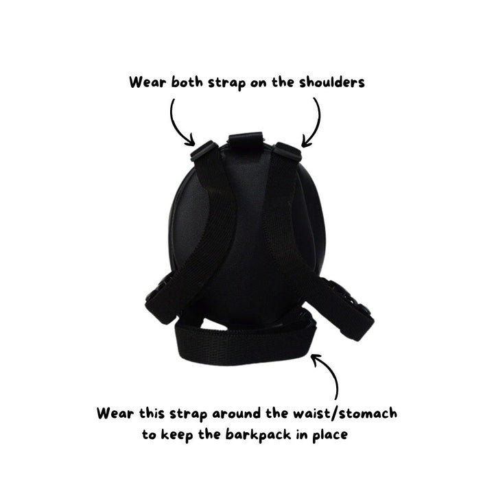 How to wear a Ruffsack backpack by wearing the straps around the shoulders and stomach to secure the backpack in place.